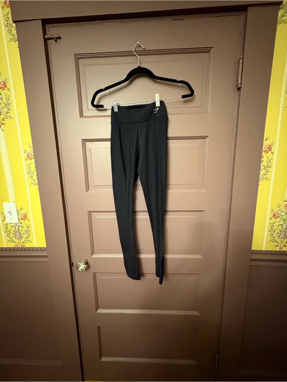 Women’s Gymshark leggings size XS Black. small repeating actual hole design